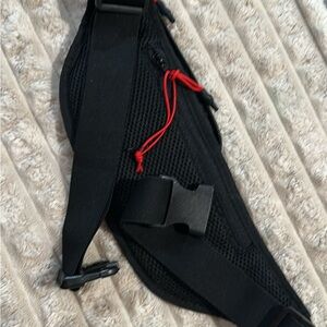 Sleek Black Belt Bag with Red Details